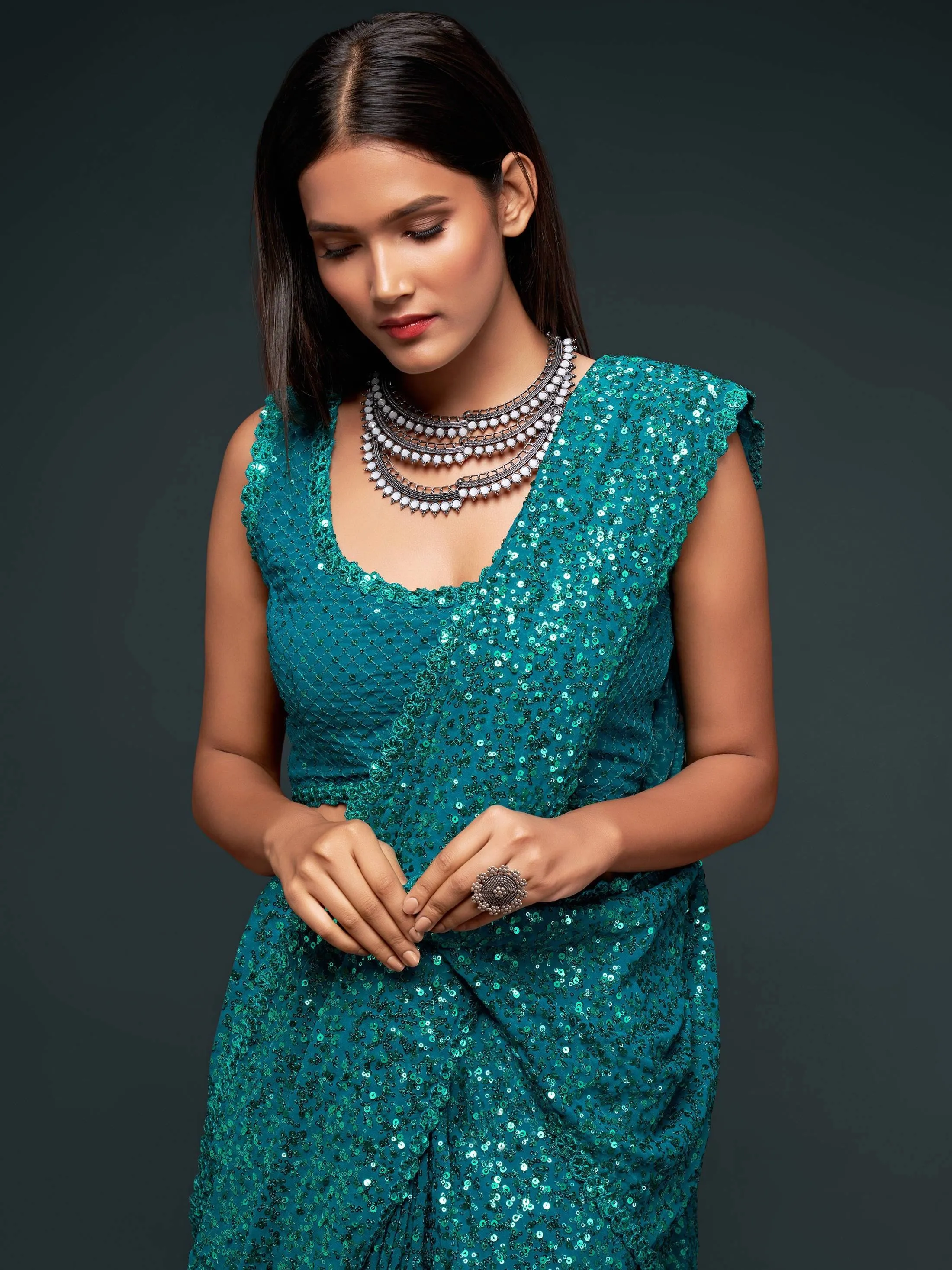 Teal Blue Georgette Sequined Saree